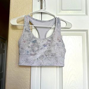 white sports bra with blue and purple size medium